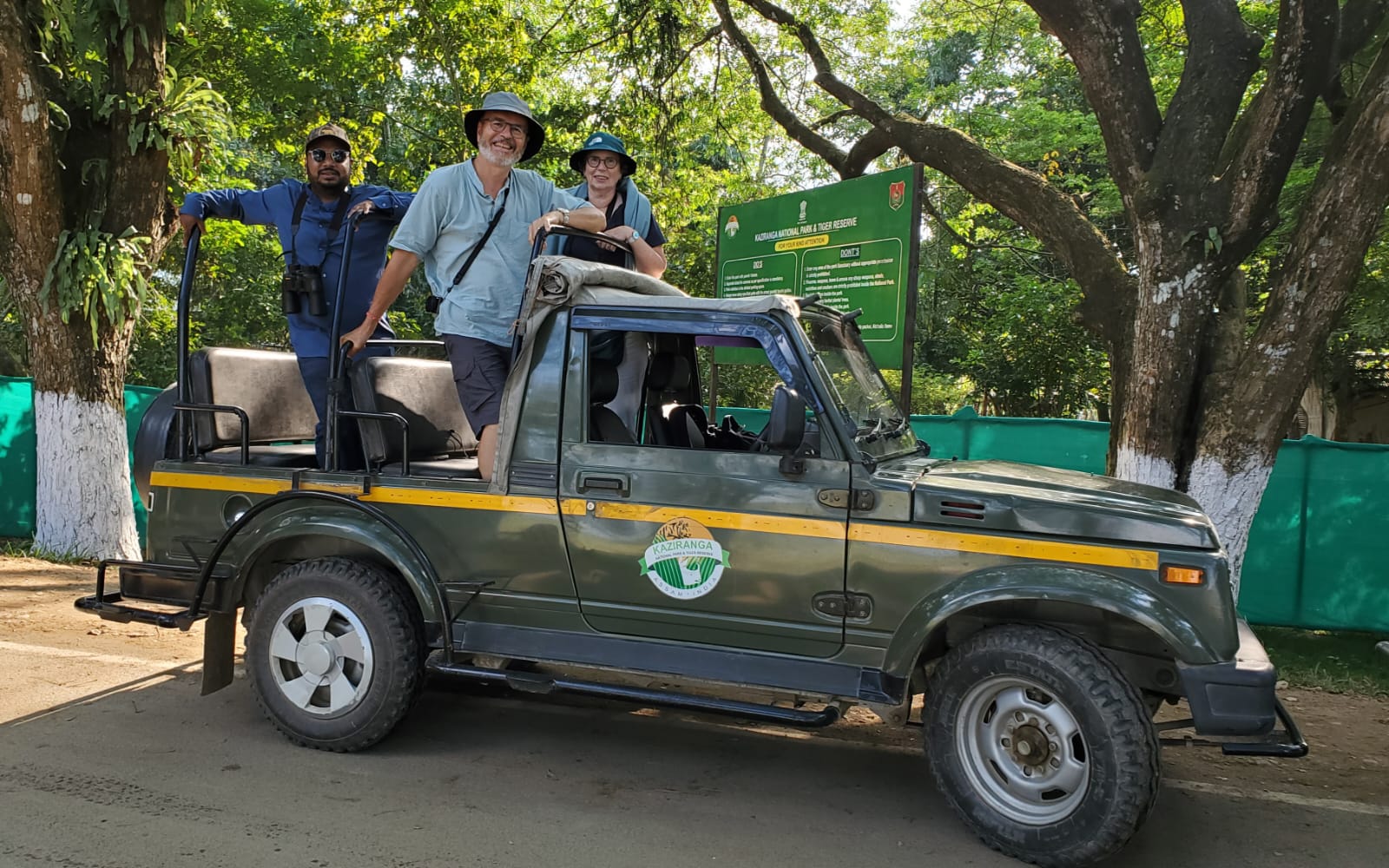 Robert and Odile with their naturalist on a safari jeep at the Kaziranga National Park gate in Assam